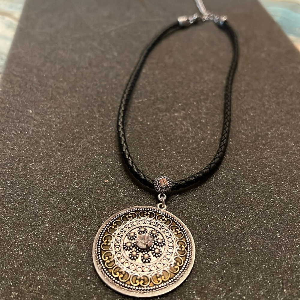 Silver with crystal necklace. Black Leather braid for chain